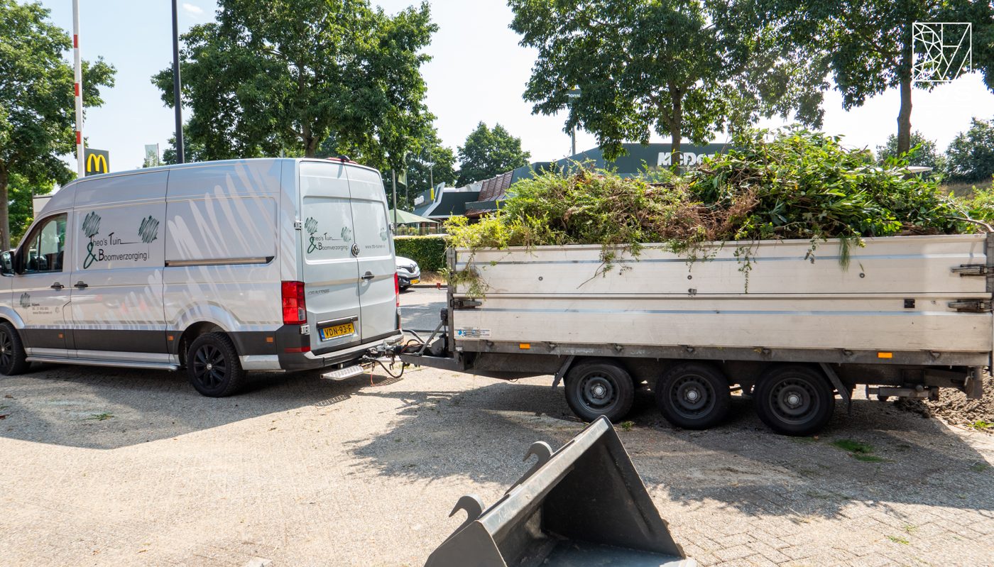 Truck loaded with old greenery removed from Luna's terrain