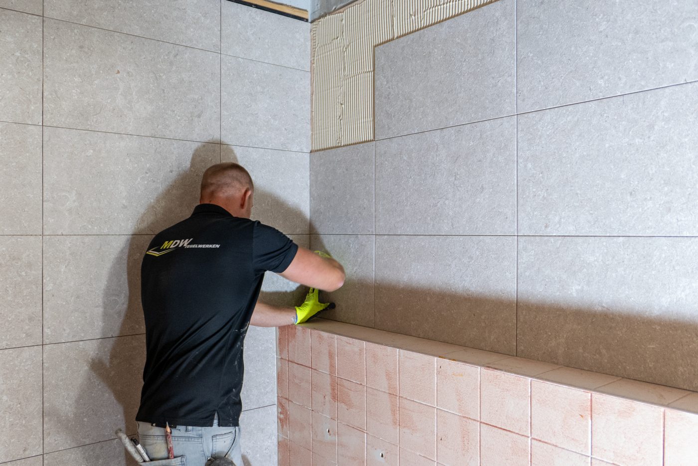 Newly tiled wall in the toilet groups at Pulse, Almere